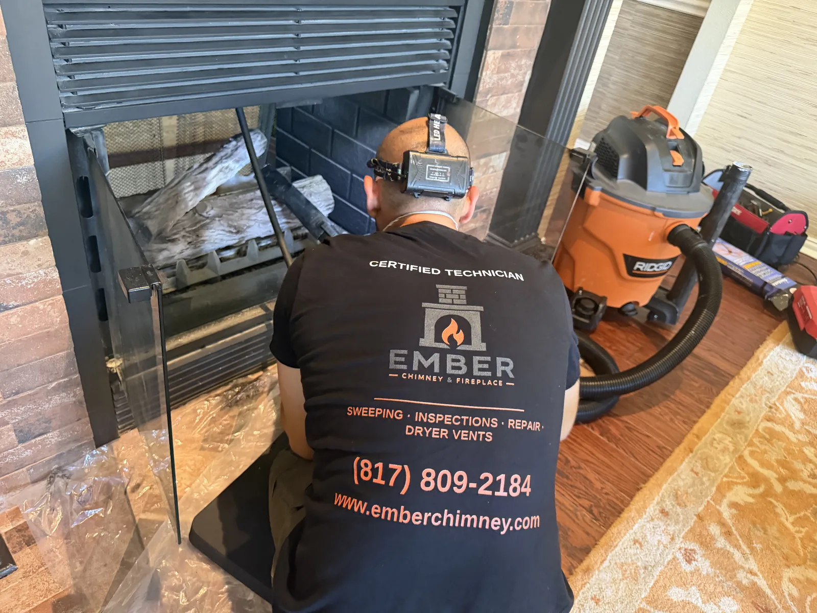Ember Chimney certified technician on a fireplace job