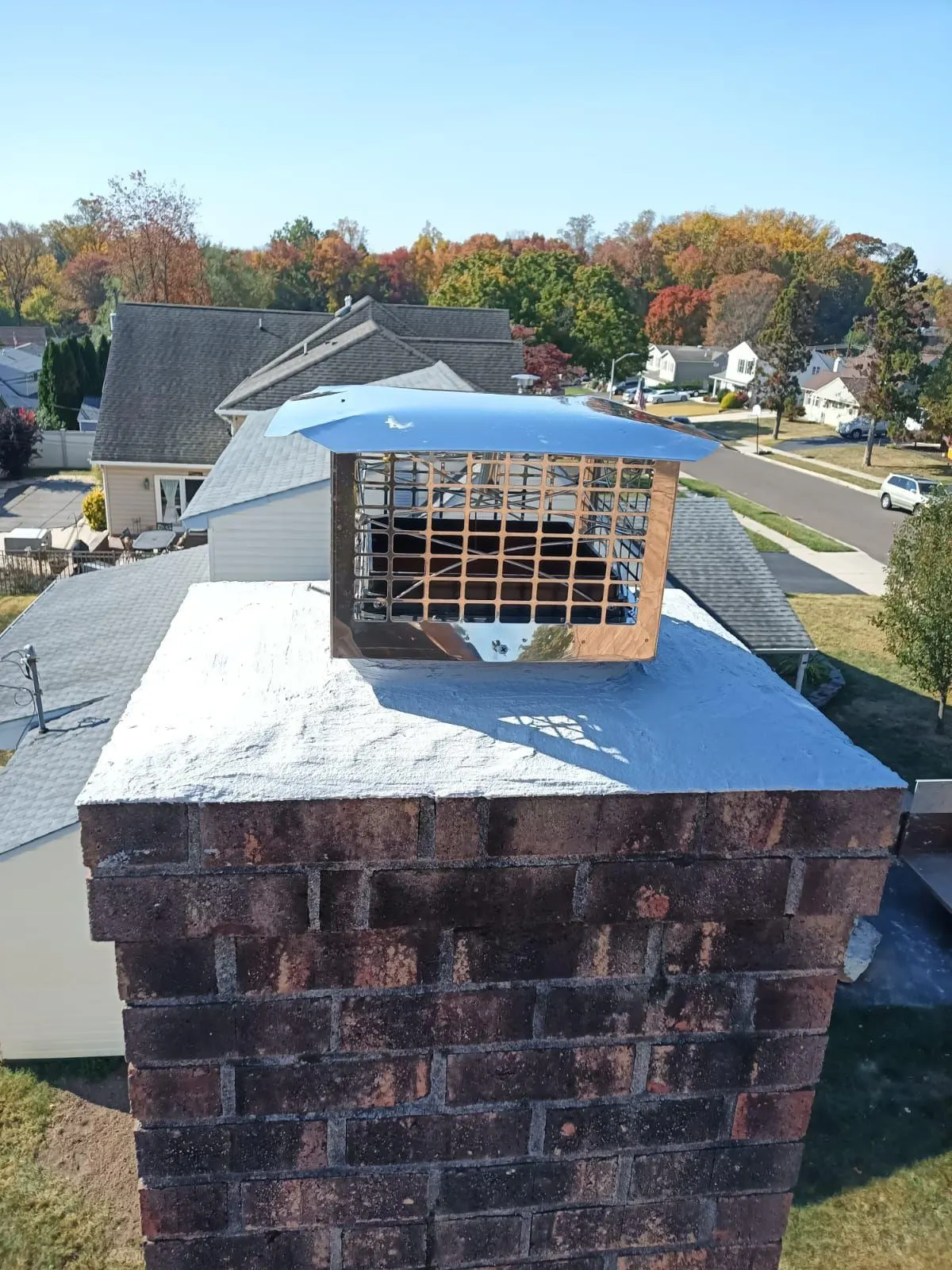 Chimney cap seated on a crown