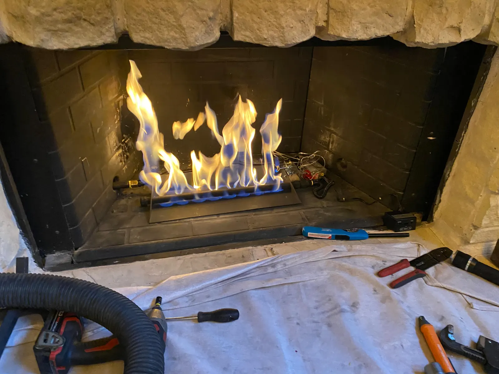 Fireplace opened for gas log service
