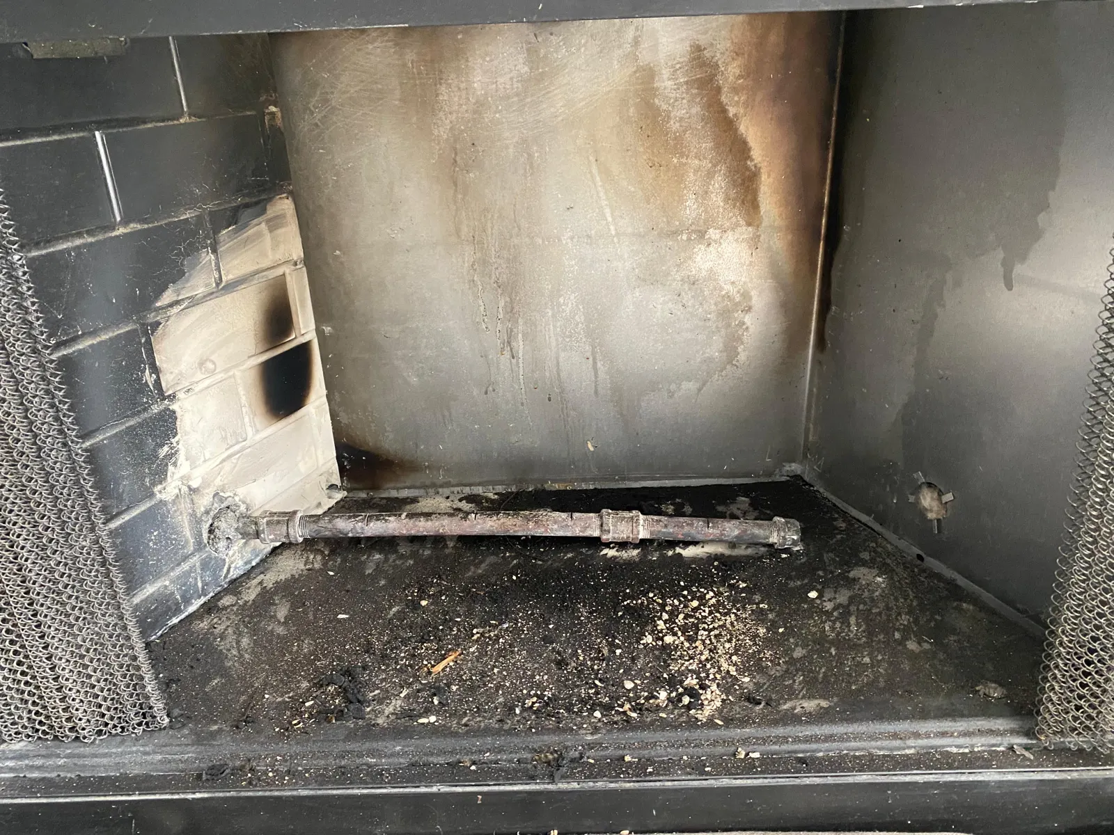Dirty fireplace interior
