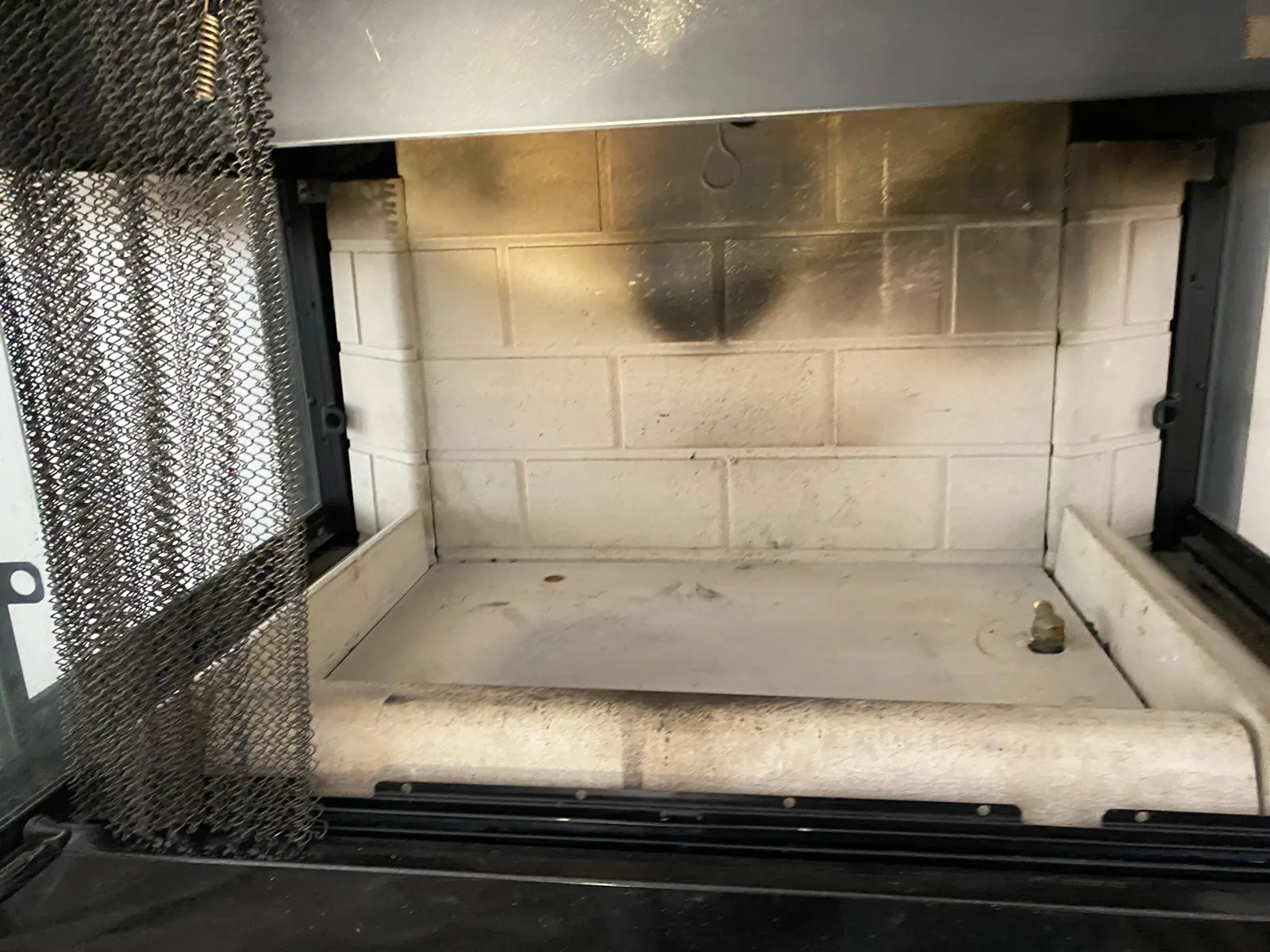 Metal fireplace interior opened up