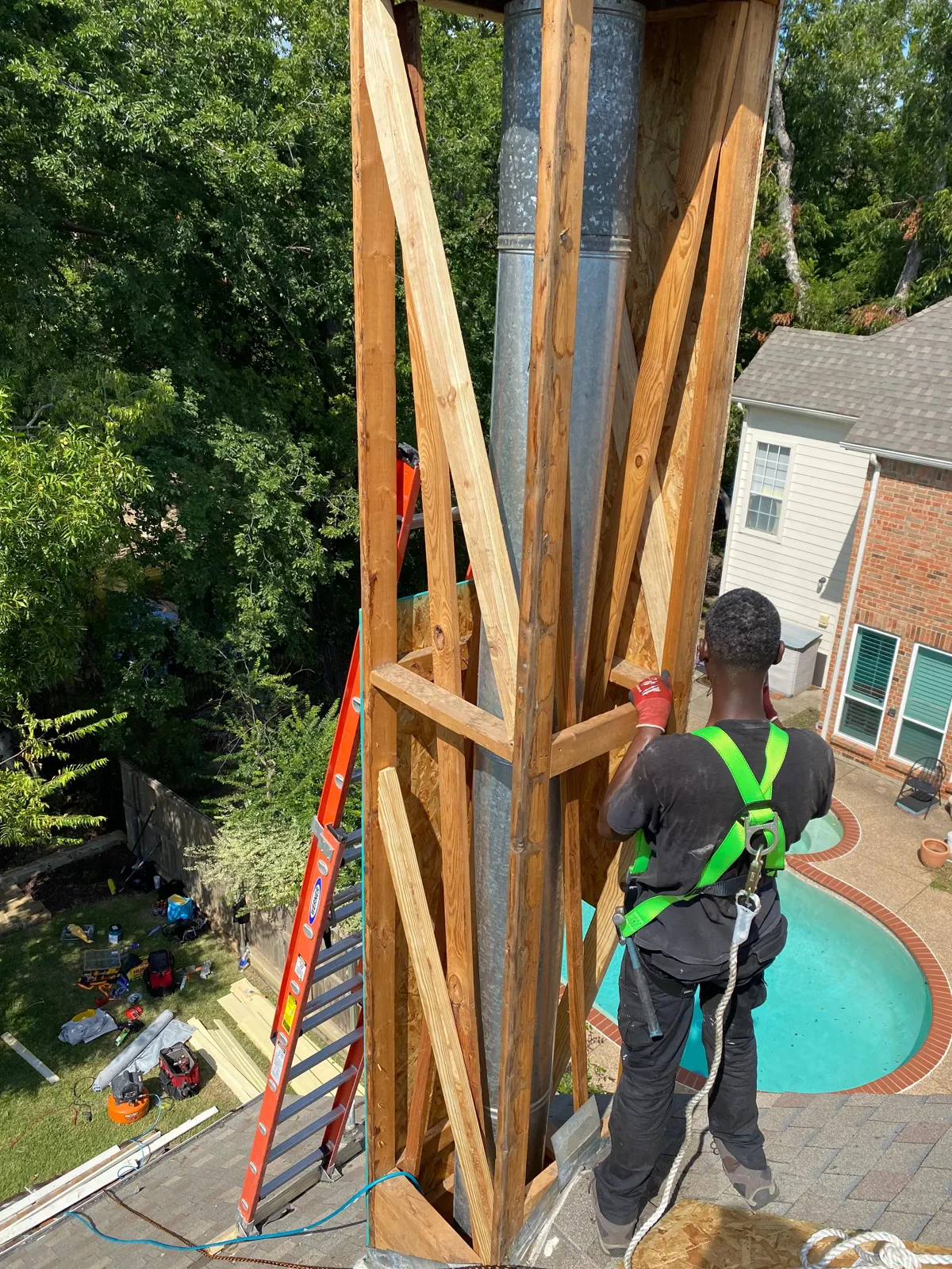 Technician at a chimney chase